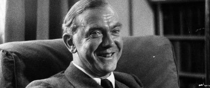photograph of the author graham greene smiling