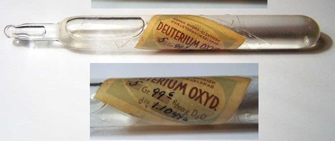 A test tube containing heavy water samples, along with a zoomed in photo of the label with German writing