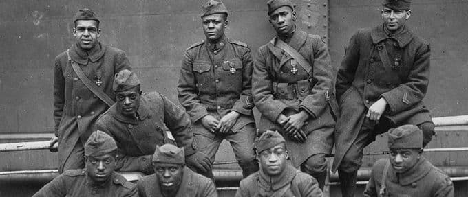 Selected Harlem Hellfighters sit for a portrait.