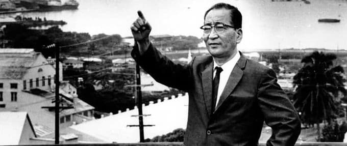Mitsuo Fuchida stands in front of Pearl Harbor in 1966.