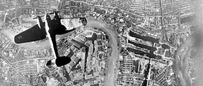 black and white photo of a German Luftwaffe bomber flying over England, Sep 7 1940