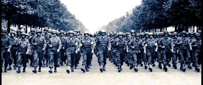 soldiers marching in line from the cover of 'The Victors: Eisenhower and His Boys'